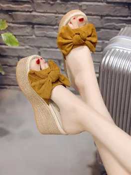 Sommeren nye mode, bue muffin bunden tøfler vilde lavvandede koreanske version af den skråning med anti-slip sandaler og tøfler.